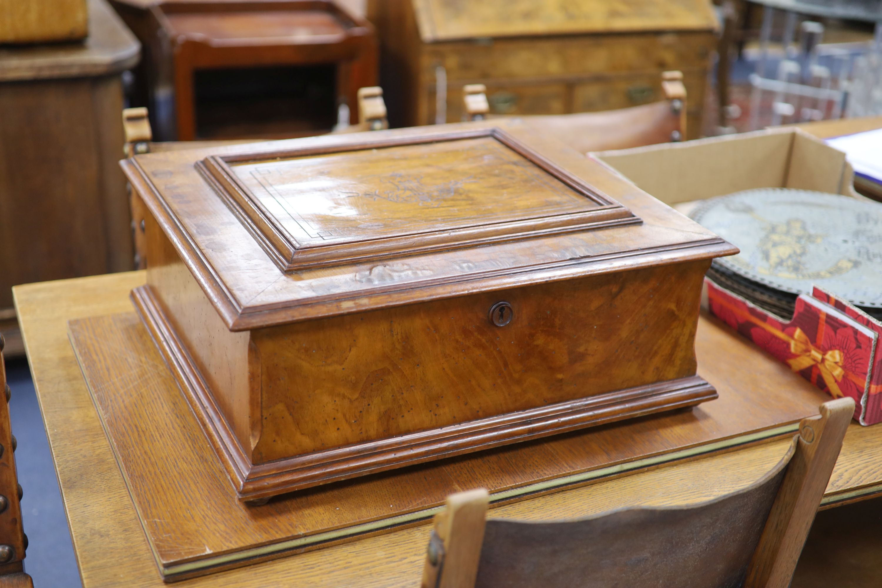 A large Polyphon walnut table top musical box, playing thirty 39.5cm discs